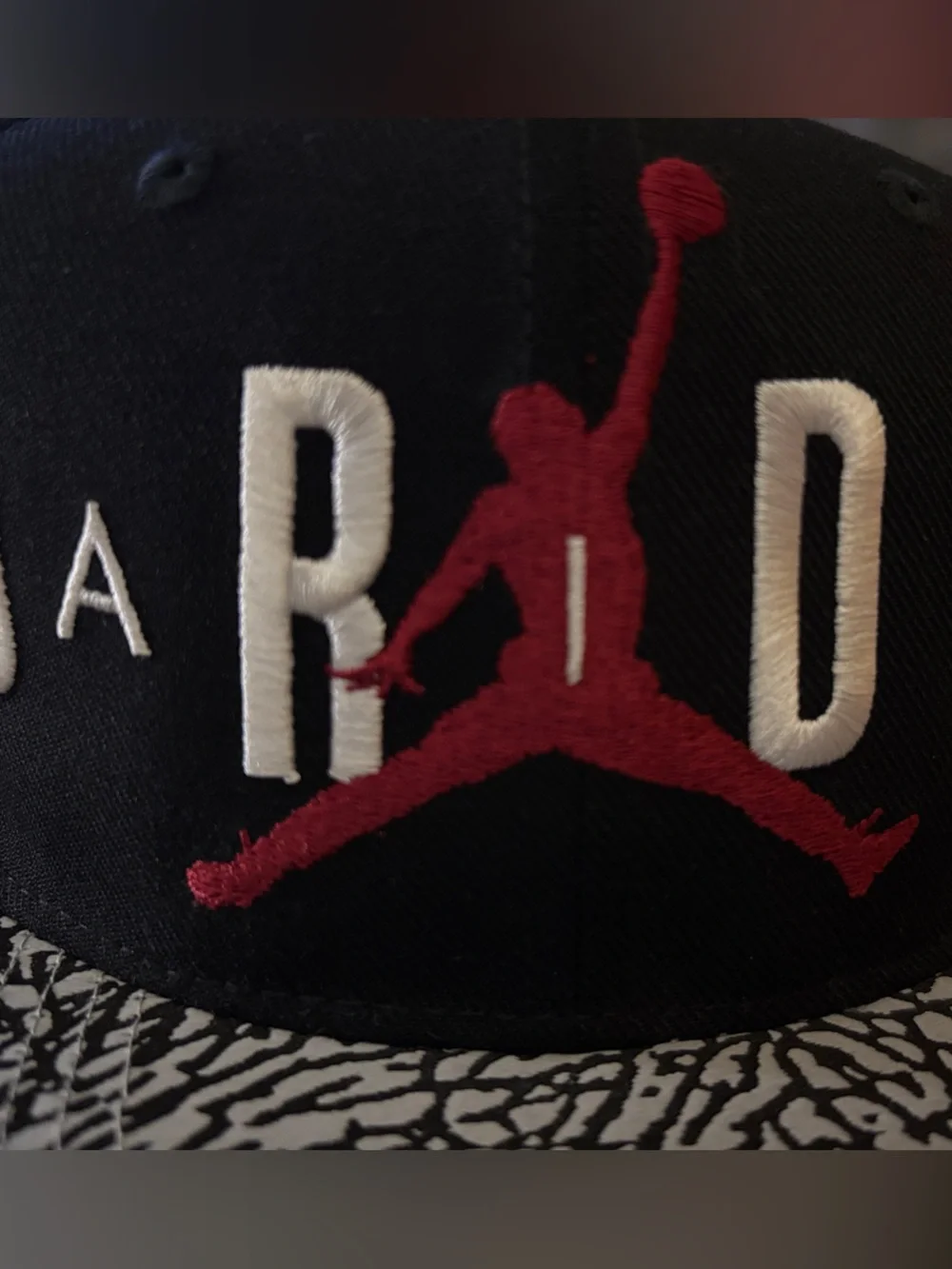 Jordan Black Snapback with Grey Elephant-Print Brim and Red Jumpman